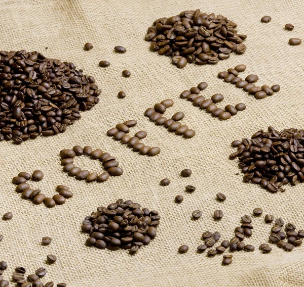 Tegn laget av kaffebønner – stockfoto