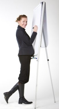 Businesswoman at whiteboard clipart