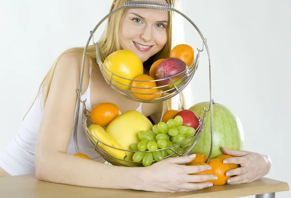 Woman during breakfast with fruit — Stock Photo, Image
