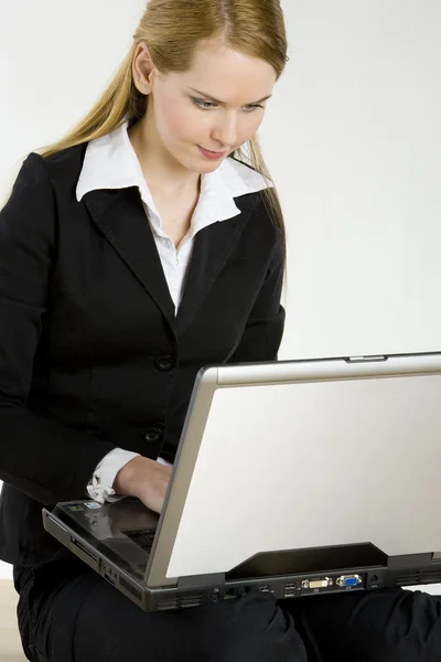 Businesswoman with a notebook — Stock Photo, Image