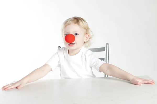stock image Portrait of little girl with a clown nose