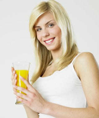 Woman with a glass of juice clipart