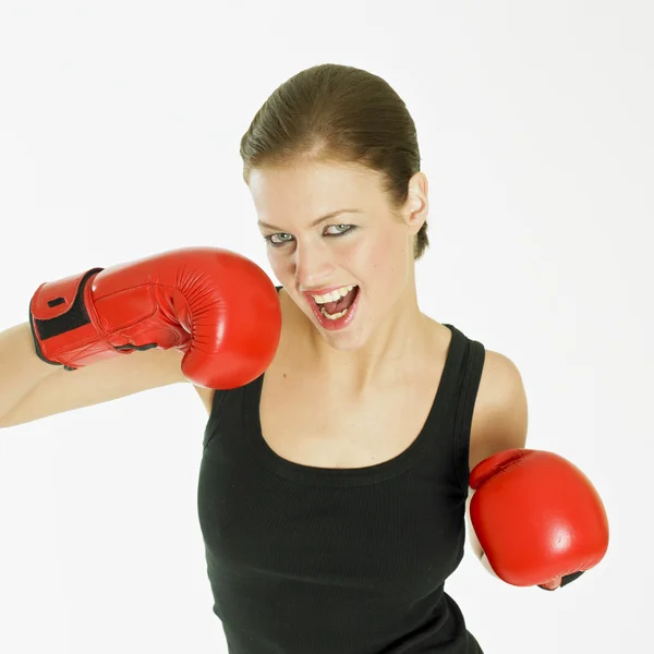 Женщина в боксёрских перчатках — стоковое фото