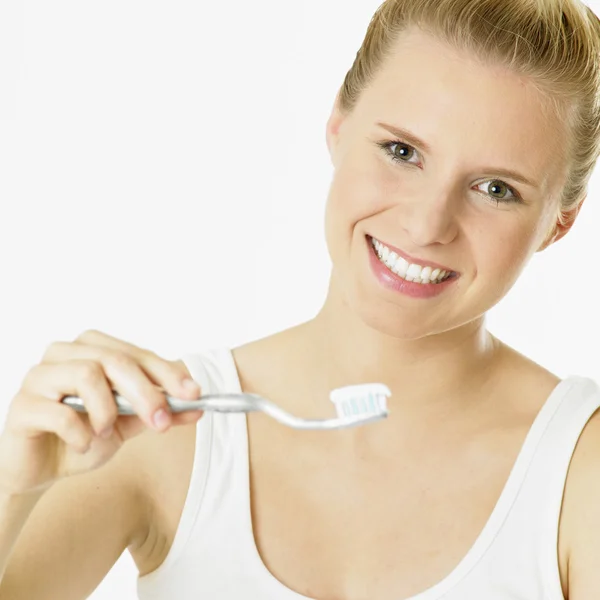 Kvinna med tandborste — Stockfoto