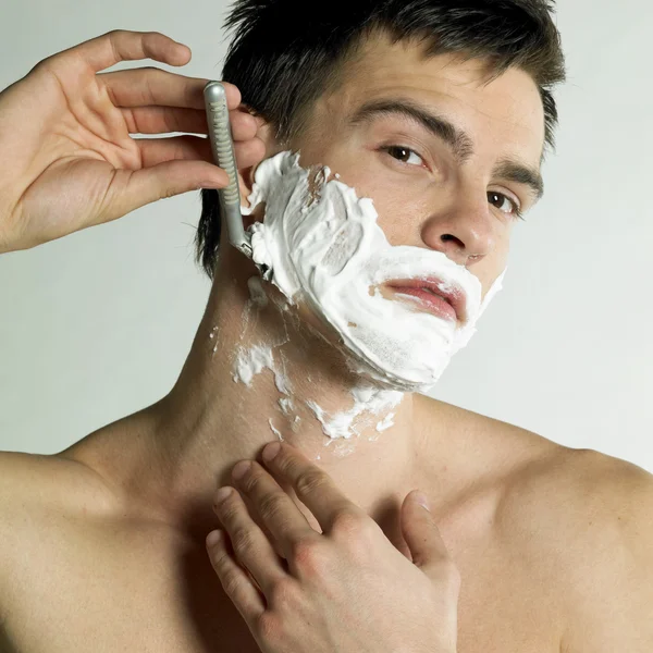 stock image Shaving man