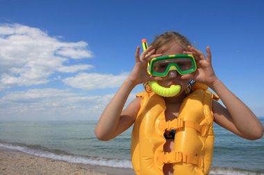 Young diver with equipment clipart