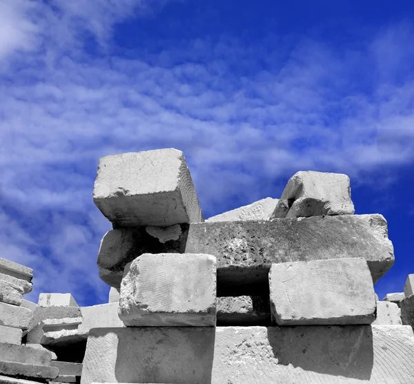 Concrete blocks on the sky background — Stock Photo, Image