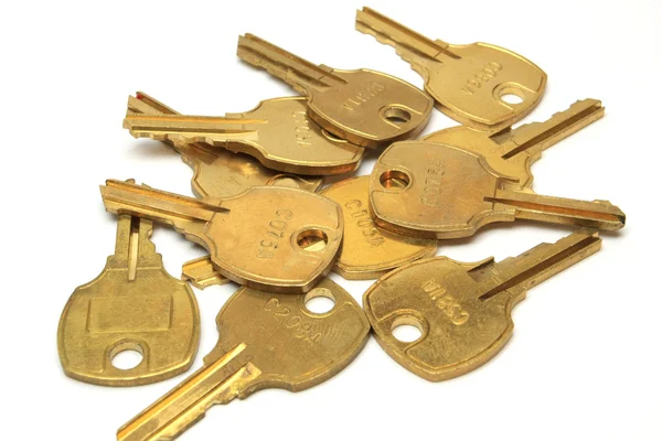Mnoho žluté bronzové klíče — Stock fotografie