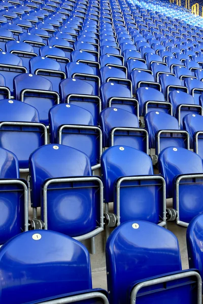 Blue seats on stadium Stock Photo