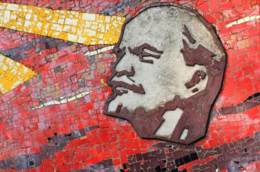 Lenin mosaic on monument's wall clipart