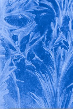 Abstract background with frost on glass clipart