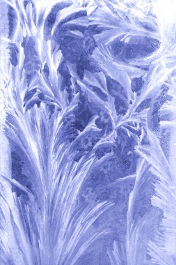 The frost picture on the window glass clipart