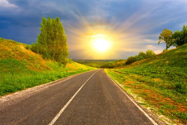 Rural road to sunset — Stock Photo, Image