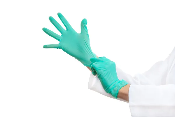 Руки в хирургических перчатках — стоковое фото
