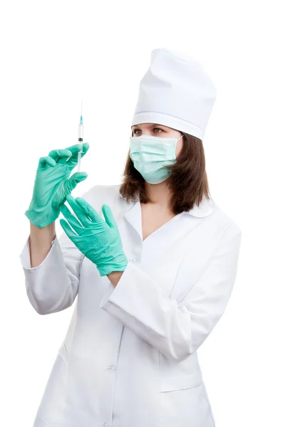 Young doctor prepares for injection — Stock Photo, Image