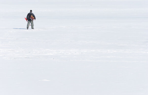 Fisherman on ice
