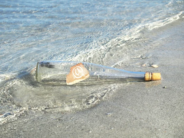 stock image AT in a bottle