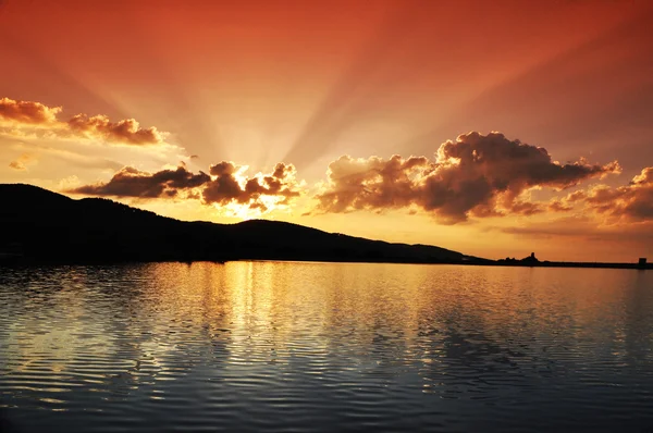 Ηλιοβασίλεμα στη λίμνη Royalty Free Εικόνες Αρχείου
