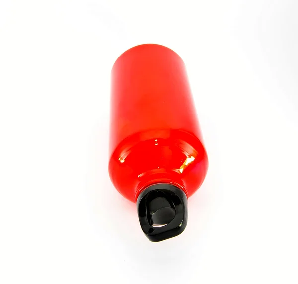 Červená láhev — Stock fotografie
