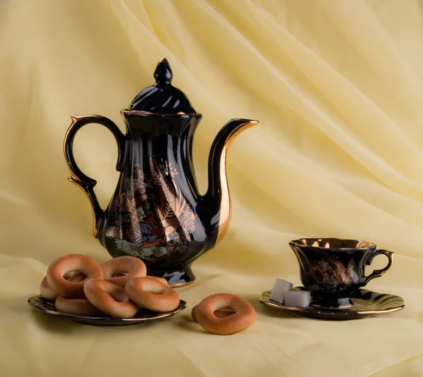 Чашки чая, чайника и печенья Лицензионные Стоковые Изображения