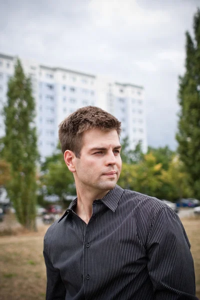 Portrait of young male in urban area Stock Image
