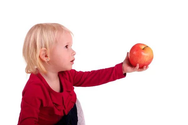 Malé dítě s jablkem — Stock fotografie