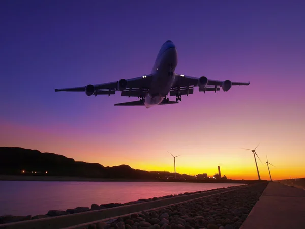 Sunset and airplane — Stock Photo, Image