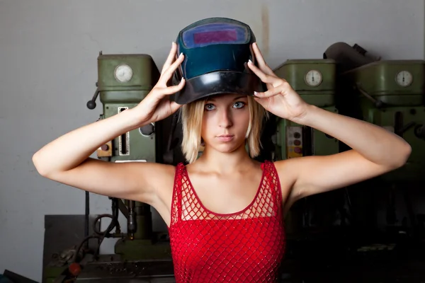 Young woman with a welder mask — Stock Photo, Image