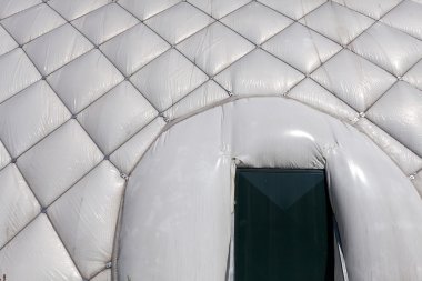 Detail of a air inflated tent on a sunny day clipart