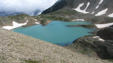 The alpine lake in the Caucasus clipart