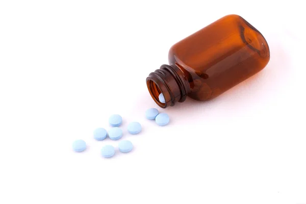 Modré pilulky a jed varování — Stock fotografie