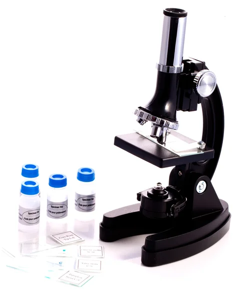 Microscopio y frascos de muestras —  Fotos de Stock