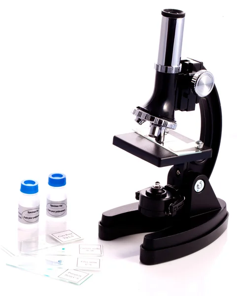 Mikroskop ve numune kavanoz — Stok fotoğraf