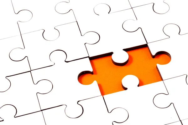 Jigsaw with one piece missing — Stock Photo, Image
