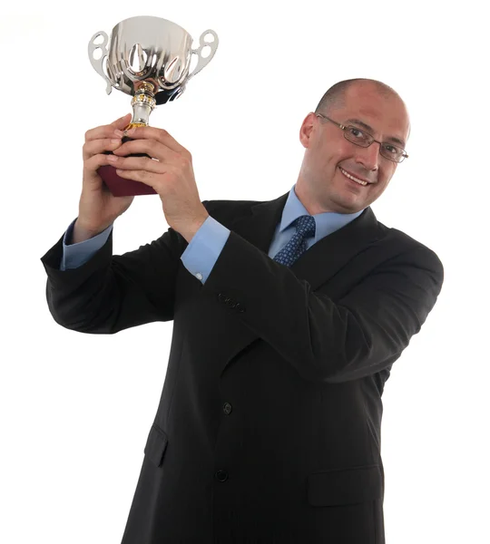 Empresário segurando troféu — Fotografia de Stock