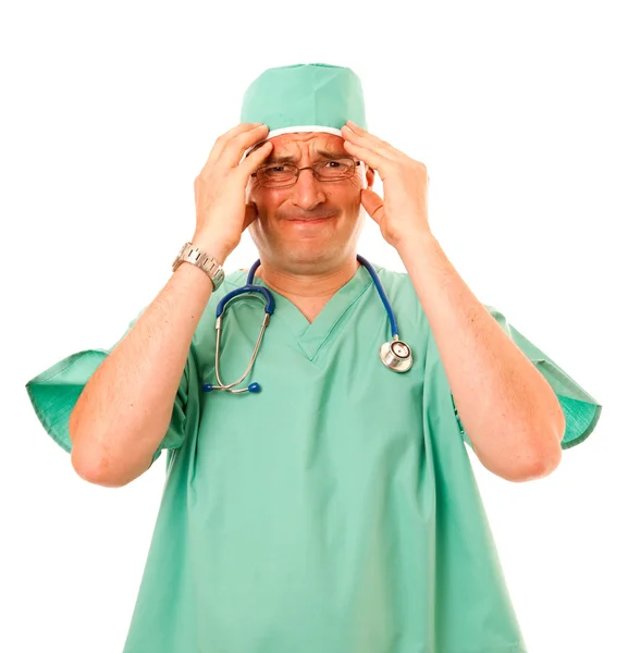Chirurg patrząc podkreślił — Zdjęcie stockowe