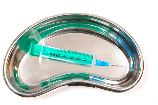 Syringe in Kidney Dish — Stock Photo, Image