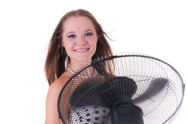 Young pretty female model posing with working fan clipart