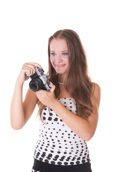 폴카 도트 드레스 35 mm 카메라와 함께 포즈를 취하는 젊은 여성 모델 — 스톡 사진