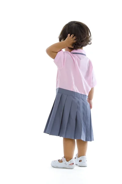 Jong meisje met schooluniform — Stockfoto