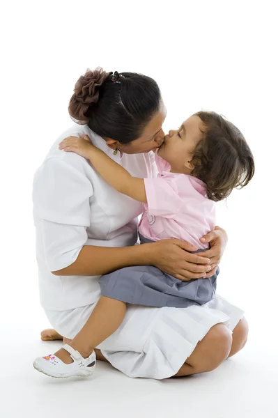 Daughter and mother kissing — Stock Photo, Image