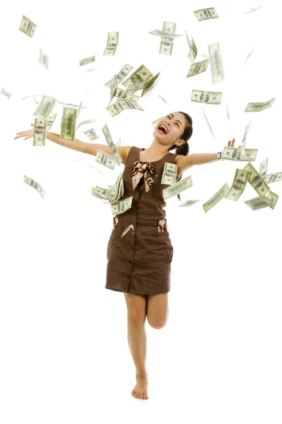 Csinos nő dobott pénz Stock Kép