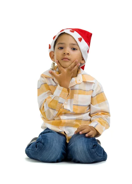 Chłopiec w kapeluszu Świętego Mikołaja — Zdjęcie stockowe