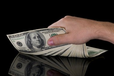 Hand with dollars clipart