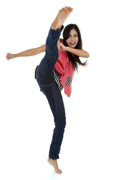 Woman kicking — Stock Photo, Image
