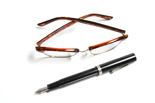 Caneta-tinteiro e óculos de olho — Fotografia de Stock