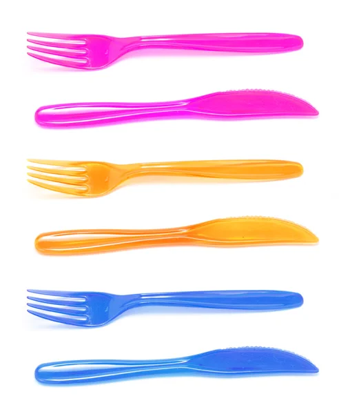 Cuchillos y tenedores de plástico — Foto de Stock
