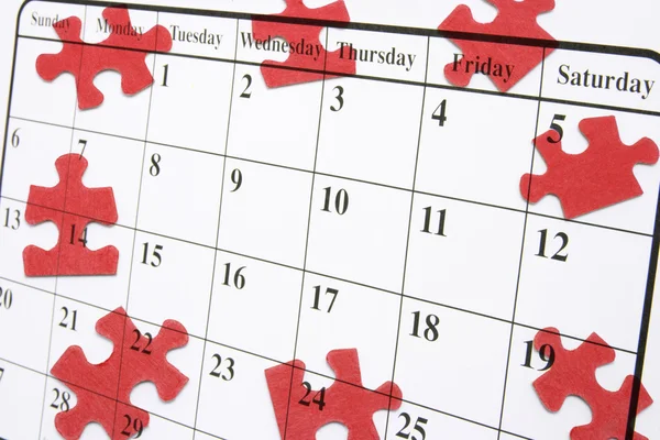 Calendar and Puzzle Pieces — Stock Photo, Image