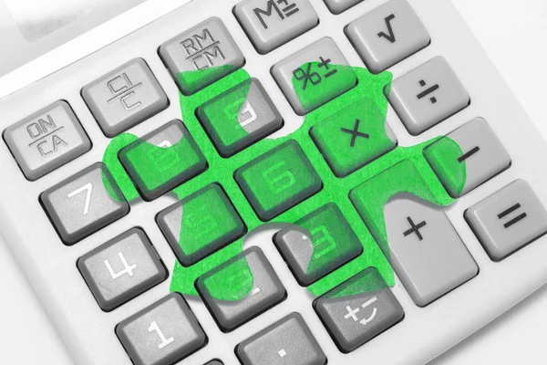 Calculator and Jigsaw Puzzle — Stock Photo, Image
