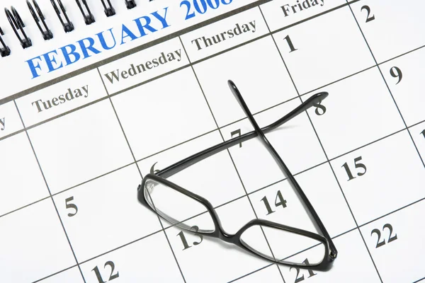Kalendarz i okulary — Zdjęcie stockowe